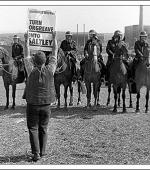 Greetings card of Orgreave Coking Plant, Near Sheffield, 18th June 1984 showing a picket holding up a placard saying "Turn Orgreave into Saltely".