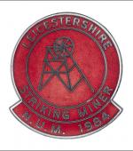 Greetings card of the enamel badge for the Leicestershire striking miners.