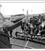 Postcard of demonstration by Labour Party Young Socialists and miners at the Conservative Party Conference in 1984.
